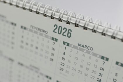 Close-up view of a 2026 spiral-bound desk calendar showing February and March.